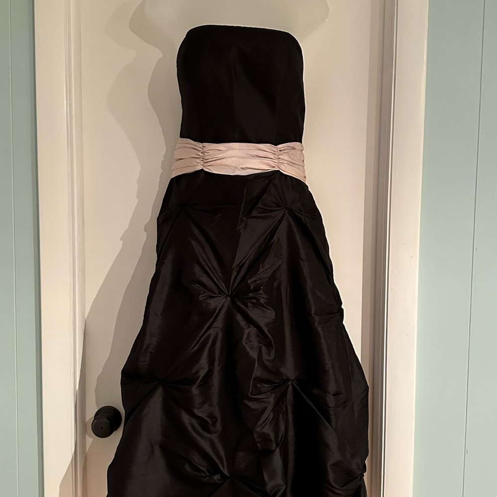 Elegant Black Strapless Gown with Pink Accent